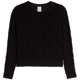 A black textured knit sweater with a crew neck and long sleeves, laid flat against a white background.