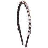 A black headband embellished with a row of clear rhinestones set in silver-toned metal along the top curve, shown against a plain white background.