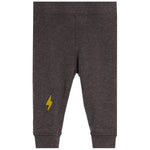 Dark heather gray jogger pants with a yellow lightning bolt graphic on the left leg, shown flat against a white background.