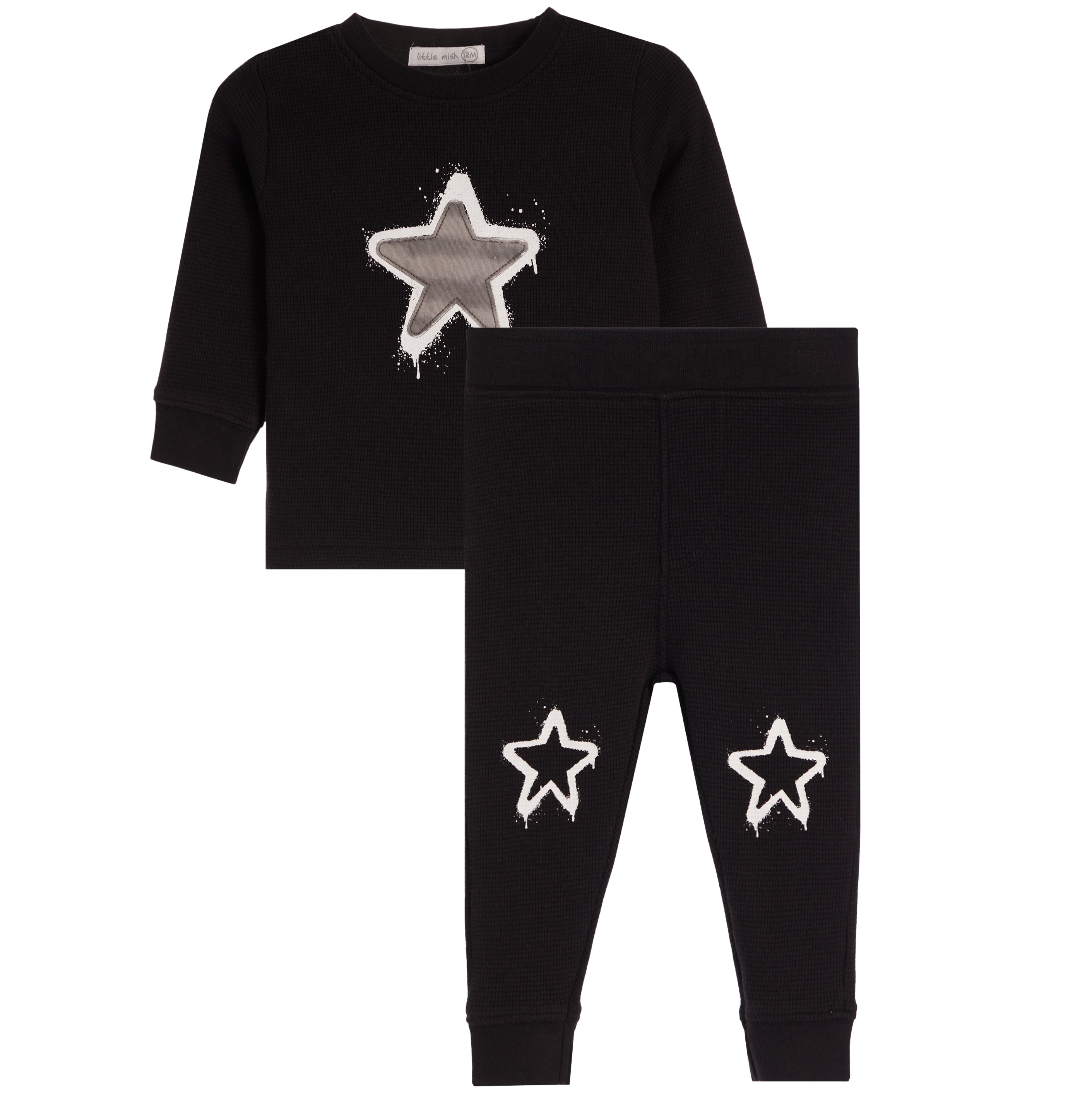 A toddler's two-piece black sweatshirt and jogger pants set. The long-sleeve sweatshirt features a large white and gray star graphic on the chest, while the matching jogger pants have two smaller white star graphics on the lower legs.