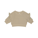 A beige ribbed knit long-sleeve crop top with ruffled shoulder details, shown flat on a white background.
