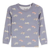 A long-sleeve baby t-shirt in dusty blue, featuring an all-over print of cartoon vintage cars in orange, beige, and gray. 