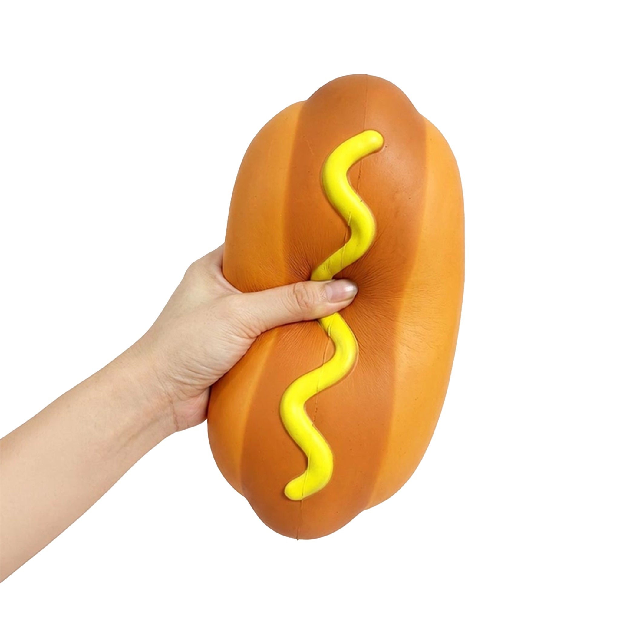 A hand holding a hot dog-shaped squishy toy against a plain white background.