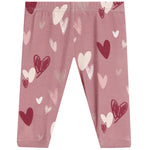 Pink pants with an all-over heart pattern in shades of dark red, light pink, and white, shown flat against a white background.
