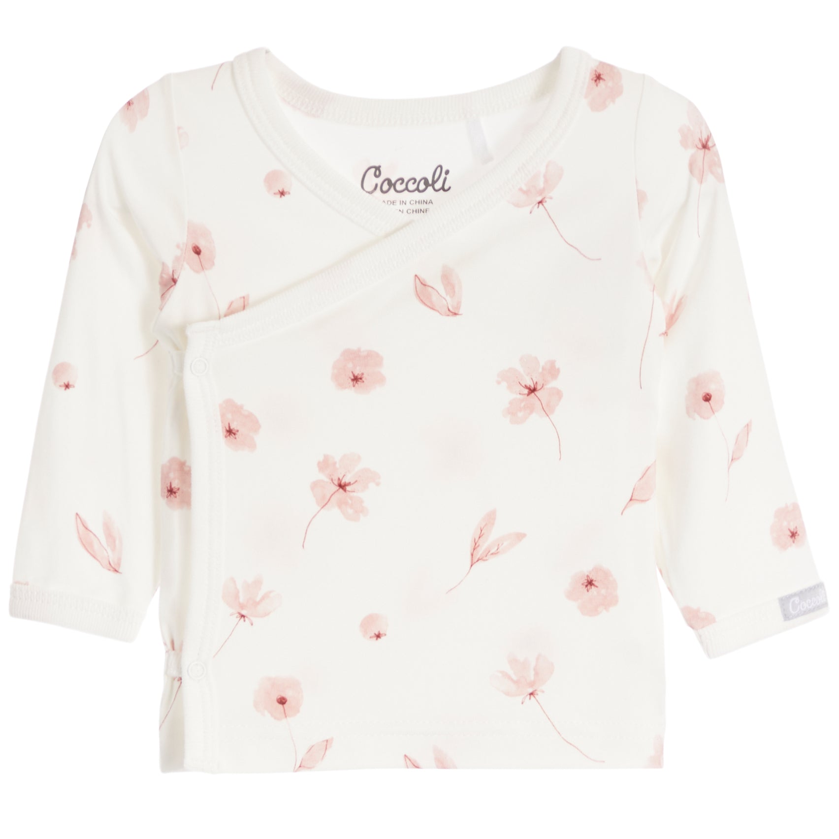 An off-white long-sleeve baby wrap top by Coccoli, featuring a delicate pink floral and leaf print scattered across the front.