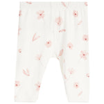 White baby pants with a delicate pink floral and leaf print, featuring an elastic waistband and leg openings.