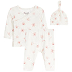 A three-piece baby clothing set featuring a long-sleeve wrap top, matching pants, and a knotted beanie, all in an off-white fabric with a delicate pink floral print.