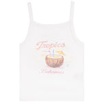 A white sleeveless tank top featuring a tropical graphic print with the words 'Tropics Bahamas' in pink script and an illustration of a coconut drink with a straw and umbrella.