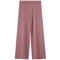 A pair of wide-leg lounge pants in a dusty rose pink color, shown flat against a solid white background.