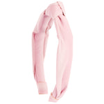 A light pink textured fabric headband with a knotted top, shown on a plain white background.