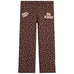 Brown pants with a beige floral pattern, featuring 'Happy Camp3r' on the left thigh and 'BE KIND!' on the right thigh, shown flat on a white background.