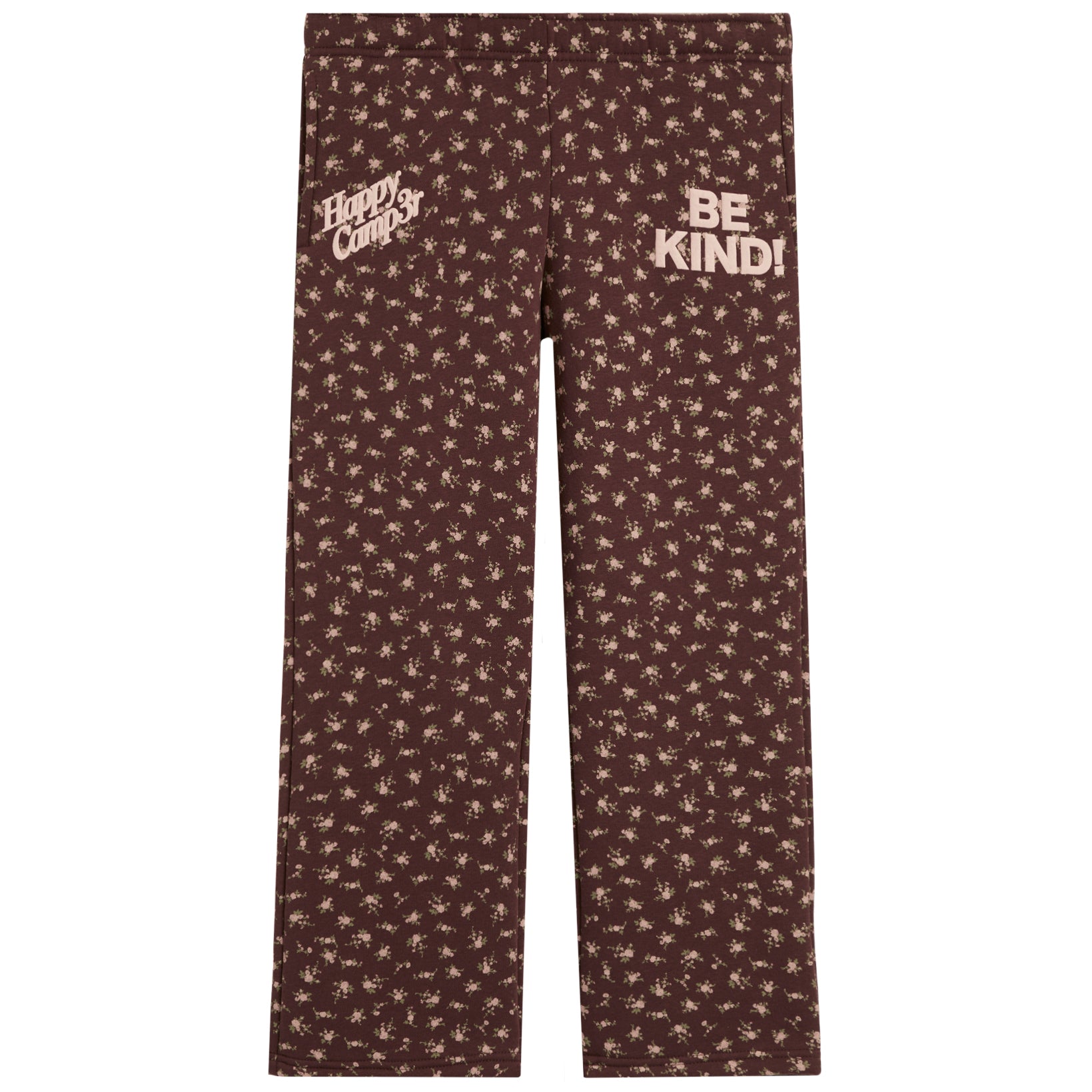 Brown pants with a beige floral pattern, featuring 'Happy Camp3r' on the left thigh and 'BE KIND!' on the right thigh, shown flat on a white background.