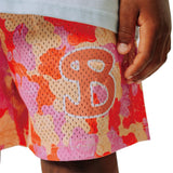 Colorful gummy bear patterned athletic shorts with a prominent letter 'B' on a white background