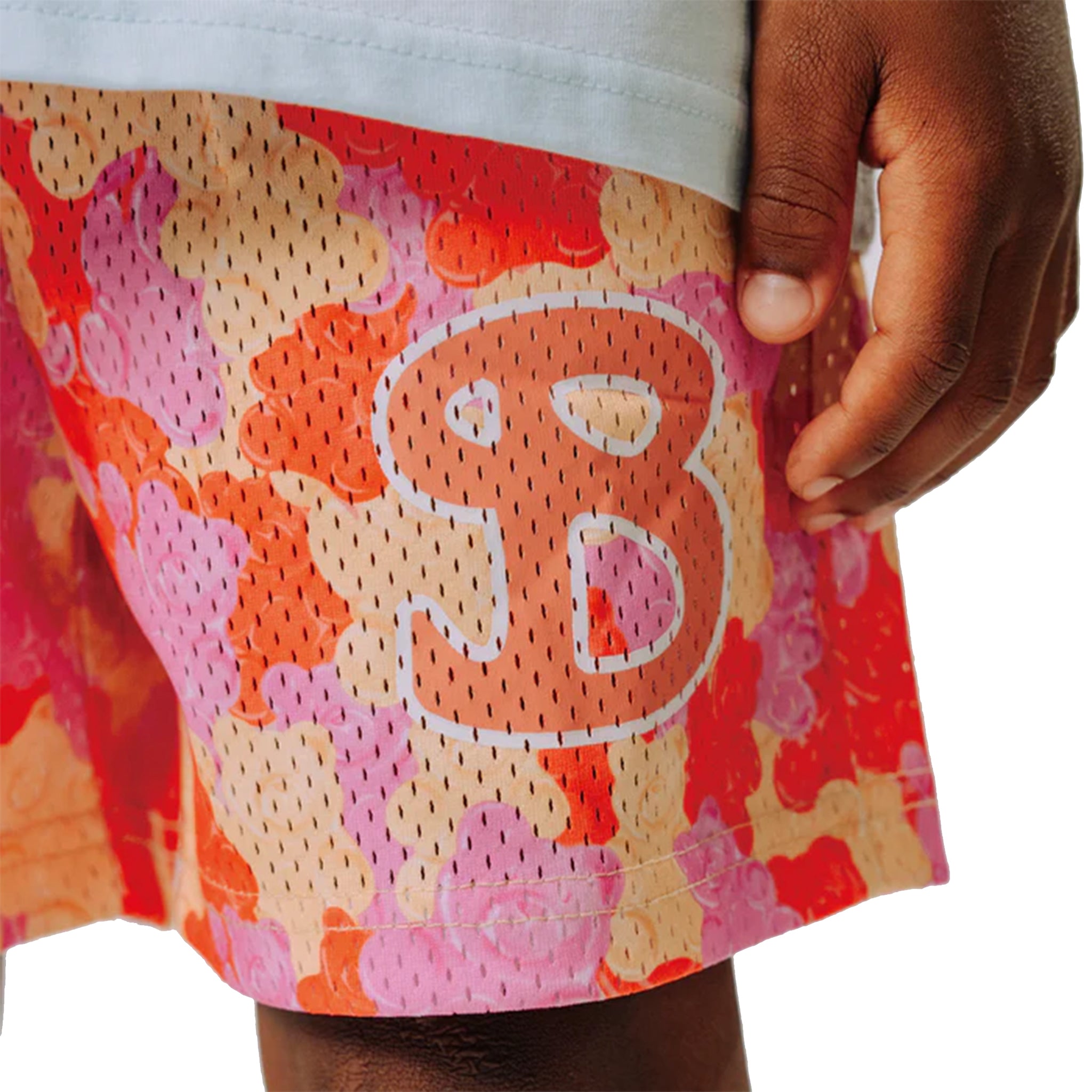 Colorful gummy bear patterned athletic shorts with a prominent letter 'B' on a white background