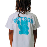 Child wearing a white t-shirt with a blue gummy bear graphic and 'BKTSQD' text on the back
