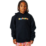 Child wearing a black hoodie with colorful 'BKTSQD' text and colorful gummy bear patterned shorts on a white background