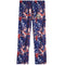 A pair of kids' pants featuring a patriotic American flag theme with stars, football players, and fireworks prints in navy blue, red, and white. A circular patch with a 'K' logo is visible on the left thigh.