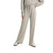 A person wearing light heather gray wide-leg sweatpants with a drawstring waist, paired with a matching gray long-sleeve top and white sneakers, shown against a plain white background.