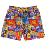 A pair of men's athletic shorts featuring an all-over print of various candy packages, including BTB, and Bigger Than Basketball, on a plain white background.